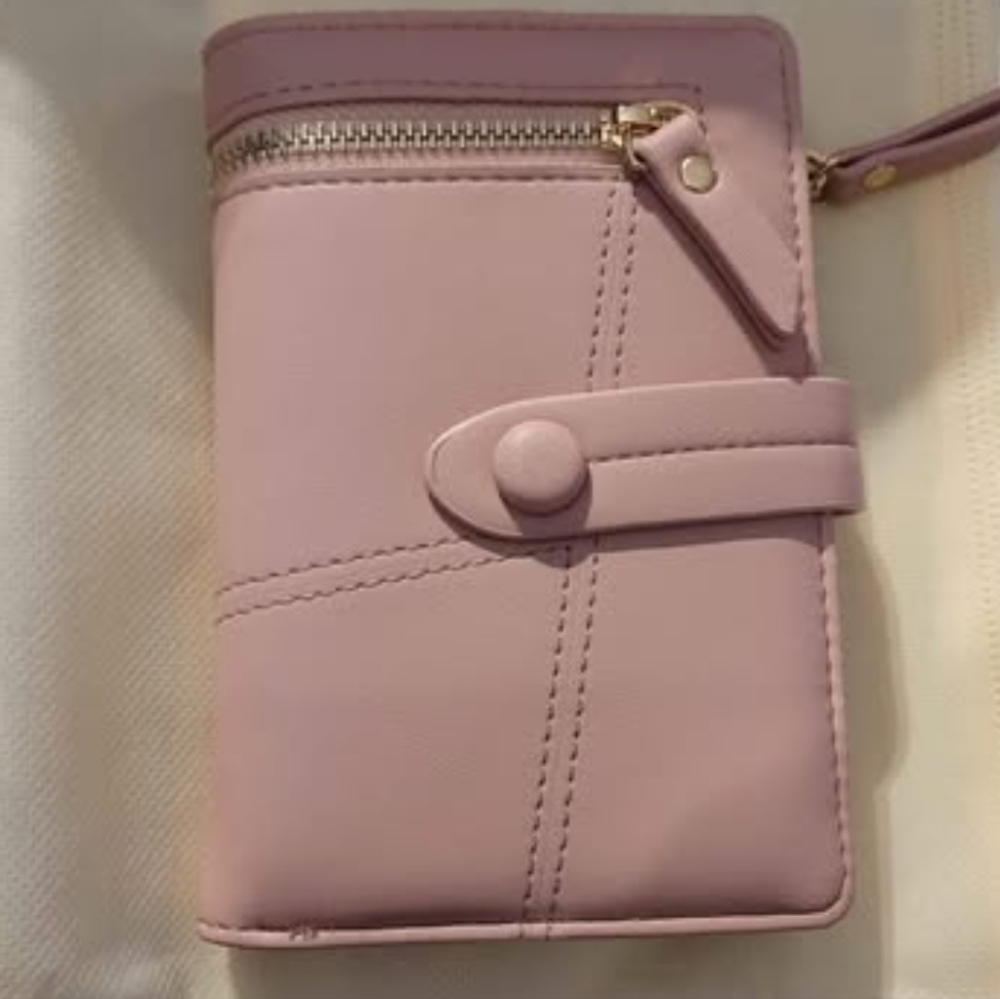New wallet purse with dust cover. Faux Leather in pale pink bifold